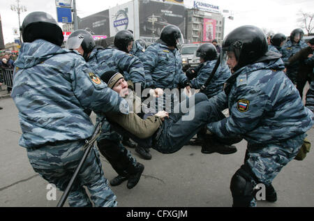 Riot police OMON arresting participants of the `Dissenters` March in Moscow. Protesters called President Vladimir Putin an enemy of the state. Stock Photo